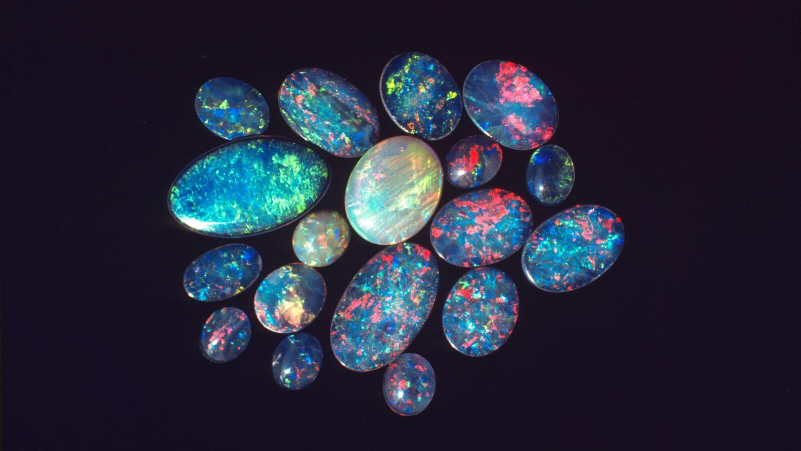 multiple opals on black background
